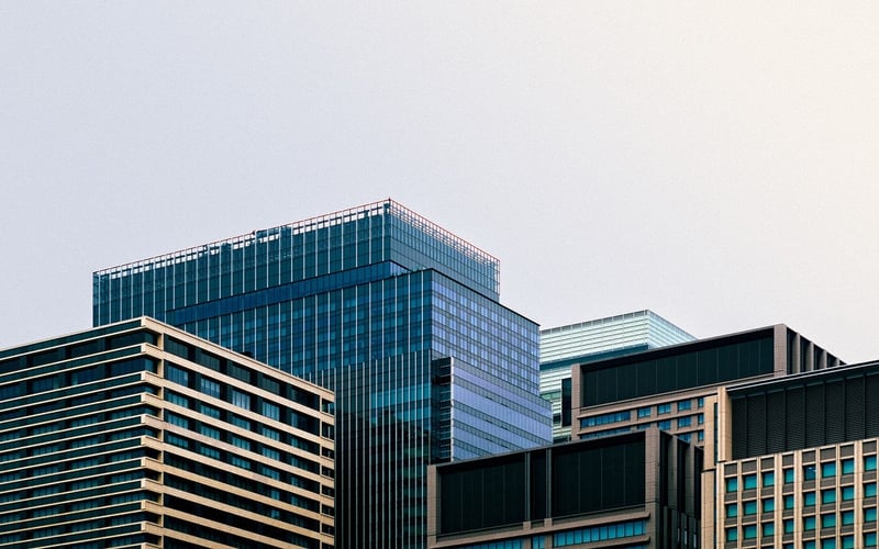 Office desk with laptop and documents